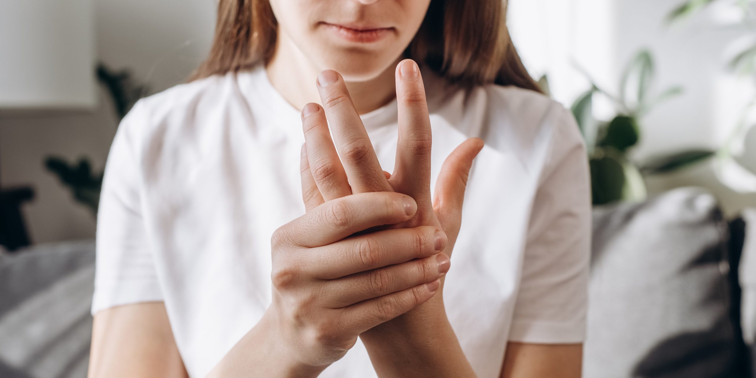 woman pressing her hand